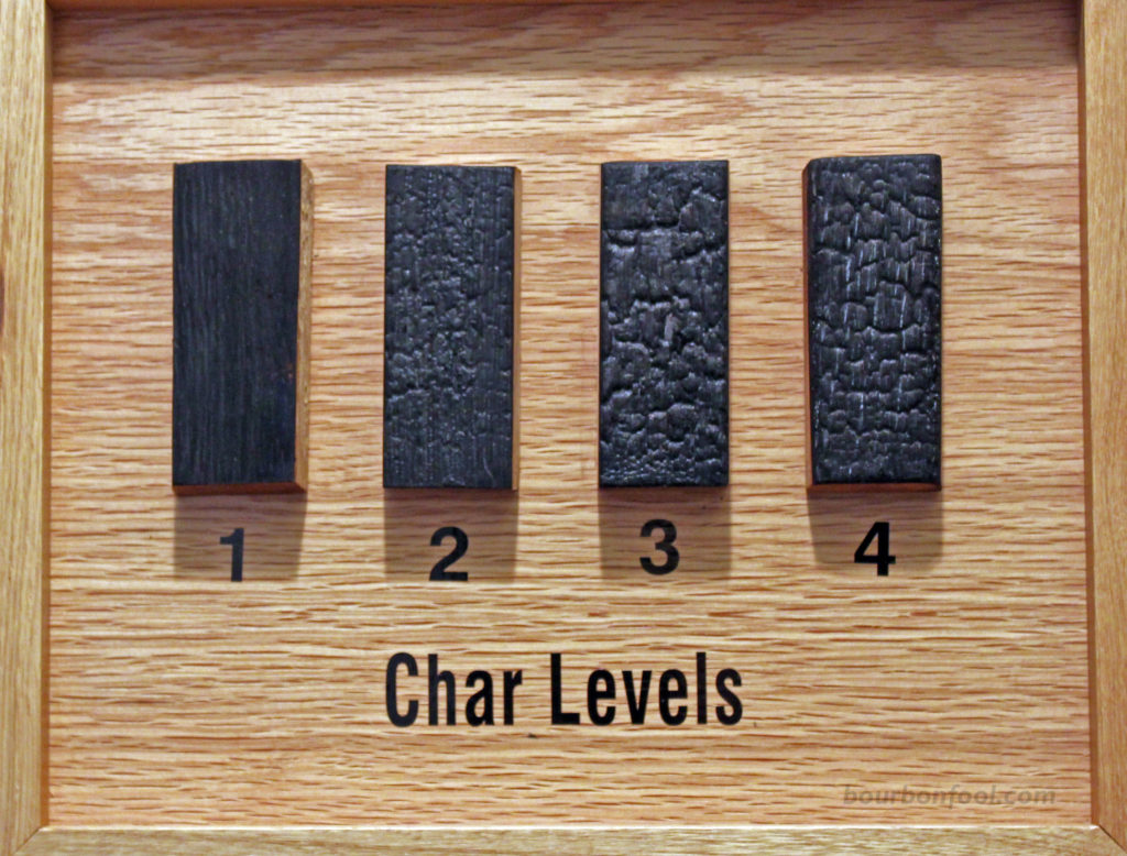 Picture of four charred barrel staves