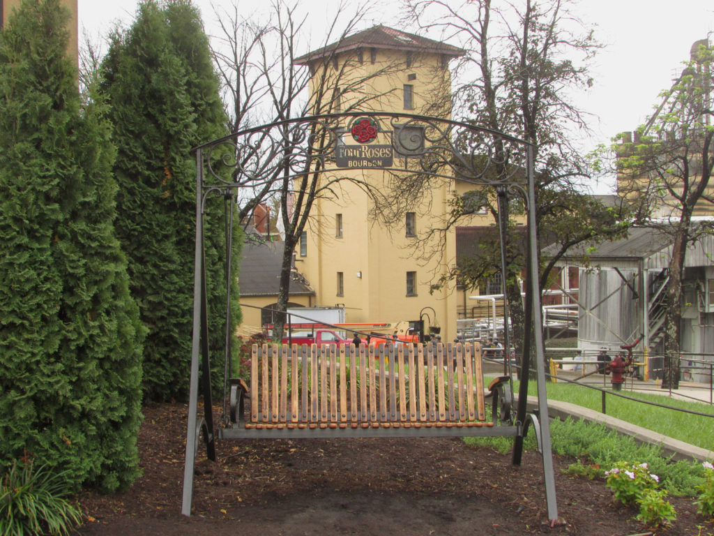 view of swing in front of four Roses Distillery