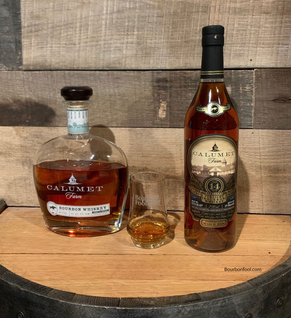 two different bottles of Calumet Farm Bourbon